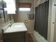 Cozy bathroom features a marble vanity, neutral-toned tile and framed mirror at 13065 Allman Dr, Mooresville, IN 46158