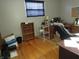 Bedroom space with wood floors, desk, and built-in shelves at 13065 Allman Dr, Mooresville, IN 46158