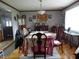 Traditional dining room with hardwood floors and a decorative area rug at 13065 Allman Dr, Mooresville, IN 46158