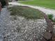 Attractive landscaping features a flower bed with ornamental rock at 13065 Allman Dr, Mooresville, IN 46158