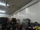 Spacious workshop area with high ceilings and ample lighting at 13065 Allman Dr, Mooresville, IN 46158