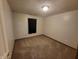 Neutral bedroom with textured walls, plush carpeting, and a minimalist aesthetic at 1317 Mulberry Ct, Greenfield, IN 46140