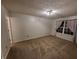 Comfortable bedroom with a window and carpeted flooring provides a cozy retreat at 1317 Mulberry Ct, Greenfield, IN 46140