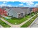 Aerial view of a well-maintained home with green lawn and surrounding neighborhood at 14444 Black Farm Dr, Noblesville, IN 46060