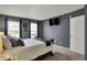 This bedroom features a comfortable bed, neutral carpet, and modern window treatments at 14444 Black Farm Dr, Noblesville, IN 46060