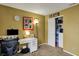 Office featuring a white desk with an adjacent closet, as well as a window for natural light at 14444 Black Farm Dr, Noblesville, IN 46060