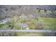 Expansive property featuring multiple homes and lush green space, offering a serene countryside setting at 1527 N Washington St, Danville, IN 46122