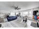 Bright and airy living room featuring large windows, comfortable seating, and stylish decor for a relaxing ambiance at 1527 N Washington St, Danville, IN 46122