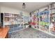 Spacious playroom featuring built-in bookshelves and ample storage, perfect for organizing toys and games at 1527 N Washington St, Danville, IN 46122