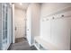 Bright entryway featuring a white bench with hooks and views to the front door at 1534 Cloverdon Dr, Westfield, IN 46074