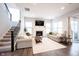 Bright living room with a fireplace, comfortable seating, and large windows at 1534 Cloverdon Dr, Westfield, IN 46074