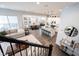 Open concept living space shows kitchen, dining, and living room in a well-lit home at 1534 Cloverdon Dr, Westfield, IN 46074