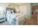 Stylish bedroom featuring chic decor, artwork, and ample closet space at 1571 Beyers St, Fortville, IN 46040