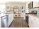 Beautiful, modern kitchen featuring stainless steel appliances, granite countertops, and plenty of cabinet space at 1571 Beyers St, Fortville, IN 46040