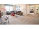 Cozy sitting area features a comfortable sectional sofa and bright natural light at 1571 Beyers St, Fortville, IN 46040