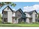 Charming exteriors showcasing modern farmhouse style with mixed materials and inviting covered front porch at 16375 Burlwood Dr, Westfield, IN 46074