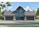 Rear view of the property showing the private garages and modern exteriors at 16375 Burlwood Dr, Westfield, IN 46074