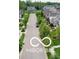 Neighborhood street view with sidewalks and mature trees at 16375 Burlwood Dr, Westfield, IN 46074