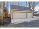 Detached two-car garage with paved driveway, offering ample parking at 1818 Central Ave, Indianapolis, IN 46202