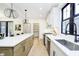Open kitchen with a modern sink, stainless steel appliances, and custom lighting at 1818 Central Ave, Indianapolis, IN 46202