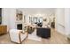 Open-concept living room with modern furnishings and lots of natural light at 1818 Central Ave, Indianapolis, IN 46202