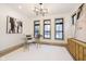 Contemporary home office featuring modern decor, black frame windows, and neutral wall paint at 1818 Central Ave, Indianapolis, IN 46202