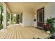 Spacious porch with wood flooring and ample natural light at 1818 Central Ave, Indianapolis, IN 46202
