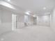 Finished basement features neutral carpet, recessed lighting, and multiple closets at 1822 Central Ave, Indianapolis, IN 46202