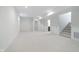 Finished basement featuring neutral carpet, recessed lighting, and multiple doorways at 1822 Central Ave, Indianapolis, IN 46202