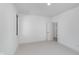Bright and spacious bedroom offering plush carpeting, a large window, and closet storage at 1822 Central Ave, Indianapolis, IN 46202
