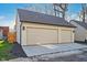 Detached two-car garage with newly paved driveway and exterior lighting at 1822 Central Ave, Indianapolis, IN 46202