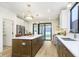 Bright kitchen with a large center island and access to the backyard at 1822 Central Ave, Indianapolis, IN 46202