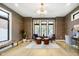 Library with textured wallpaper, hardwood floors and comfortable seating area at 1822 Central Ave, Indianapolis, IN 46202