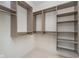 Custom designed walk-in closet with ample shelving and hanging space at 1822 Central Ave, Indianapolis, IN 46202