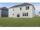 Large backyard with green lawn and home exterior at 18944 Seaforth Way, Westfield, IN 46074