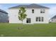 Spacious backyard with green grass and a view of the home's exterior at 18944 Seaforth Way, Westfield, IN 46074