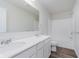 Bathroom featuring double sink vanity with a large mirror and tub with shower at 18944 Seaforth Way, Westfield, IN 46074