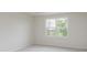 A neutral bedroom featuring carpet and a window at 18944 Seaforth Way, Westfield, IN 46074