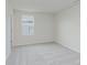 Bright bedroom featuring neutral walls and carpet, complemented by a window at 18944 Seaforth Way, Westfield, IN 46074