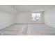 Bright bedroom with a large window and neutral-toned carpet at 18944 Seaforth Way, Westfield, IN 46074