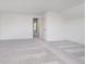 Spacious bedroom with neutral carpet, white trim, and an open doorway at 18944 Seaforth Way, Westfield, IN 46074