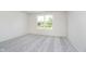 Comfortable bedroom with natural light and neutral colored carpet at 18944 Seaforth Way, Westfield, IN 46074