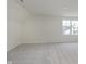 Bright bedroom with window, featuring neutral walls and flooring at 18944 Seaforth Way, Westfield, IN 46074
