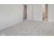 Bedroom featuring neutral carpet with access to the ensuite bath and hallway at 18944 Seaforth Way, Westfield, IN 46074
