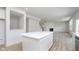 Open-concept kitchen with a large island that flows into the living space at 18944 Seaforth Way, Westfield, IN 46074
