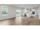 Bright kitchen boasts stainless appliances, white cabinetry, and a center island at 18944 Seaforth Way, Westfield, IN 46074