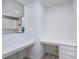 Home office area with built-in desks and white cabinets, providing a functional workspace at 18944 Seaforth Way, Westfield, IN 46074