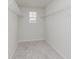 A basic walk-in closet with wire shelving and a window at 18944 Seaforth Way, Westfield, IN 46074