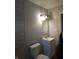 Updated bathroom featuring a modern vanity, updated light fixture, and tile flooring at 1931 Brentwood Dr, Anderson, IN 46011