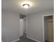 Bedroom featuring modern lighting, closet, and updated flooring at 1931 Brentwood Dr, Anderson, IN 46011